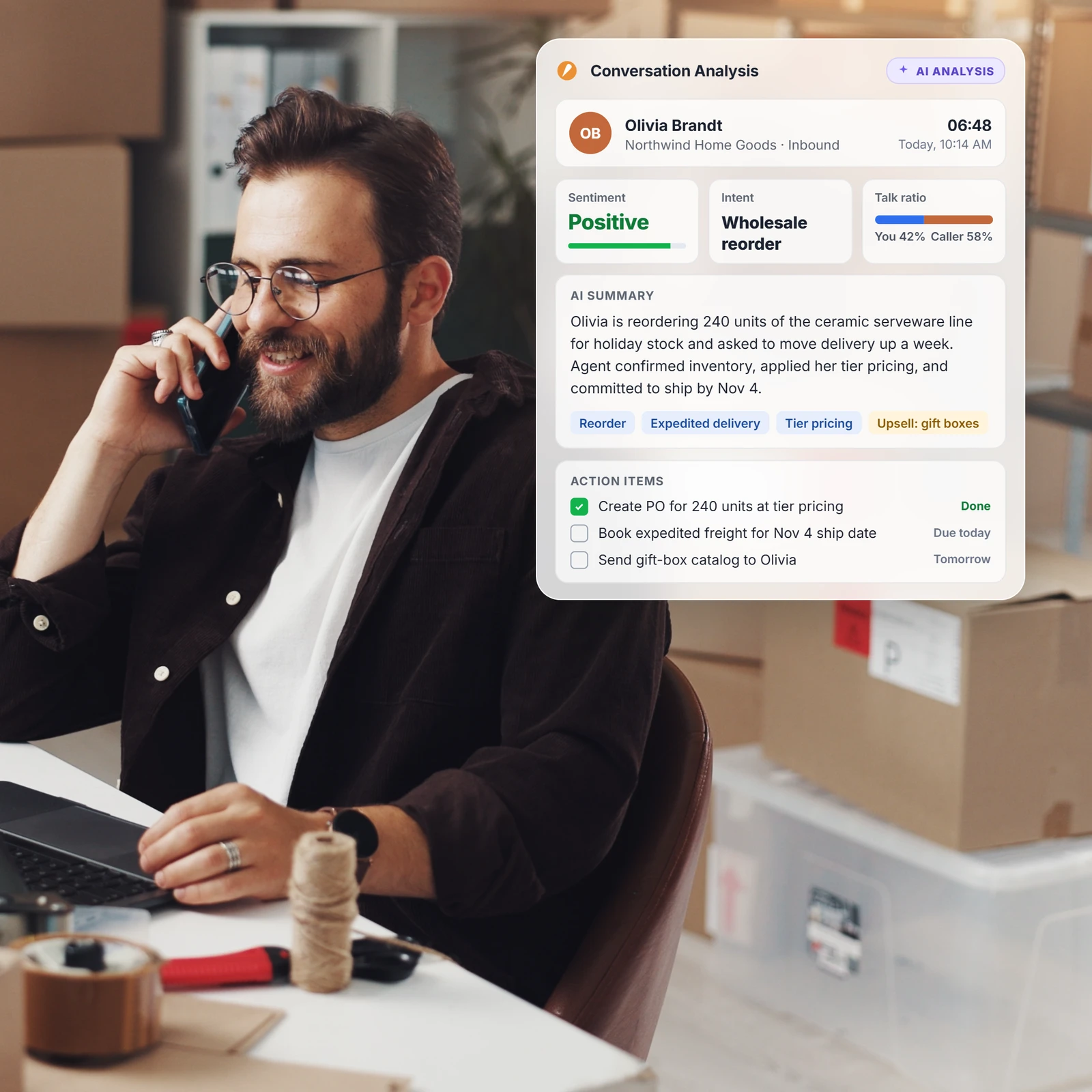 Man on a warehouse phone call next to a conversation analysis card
