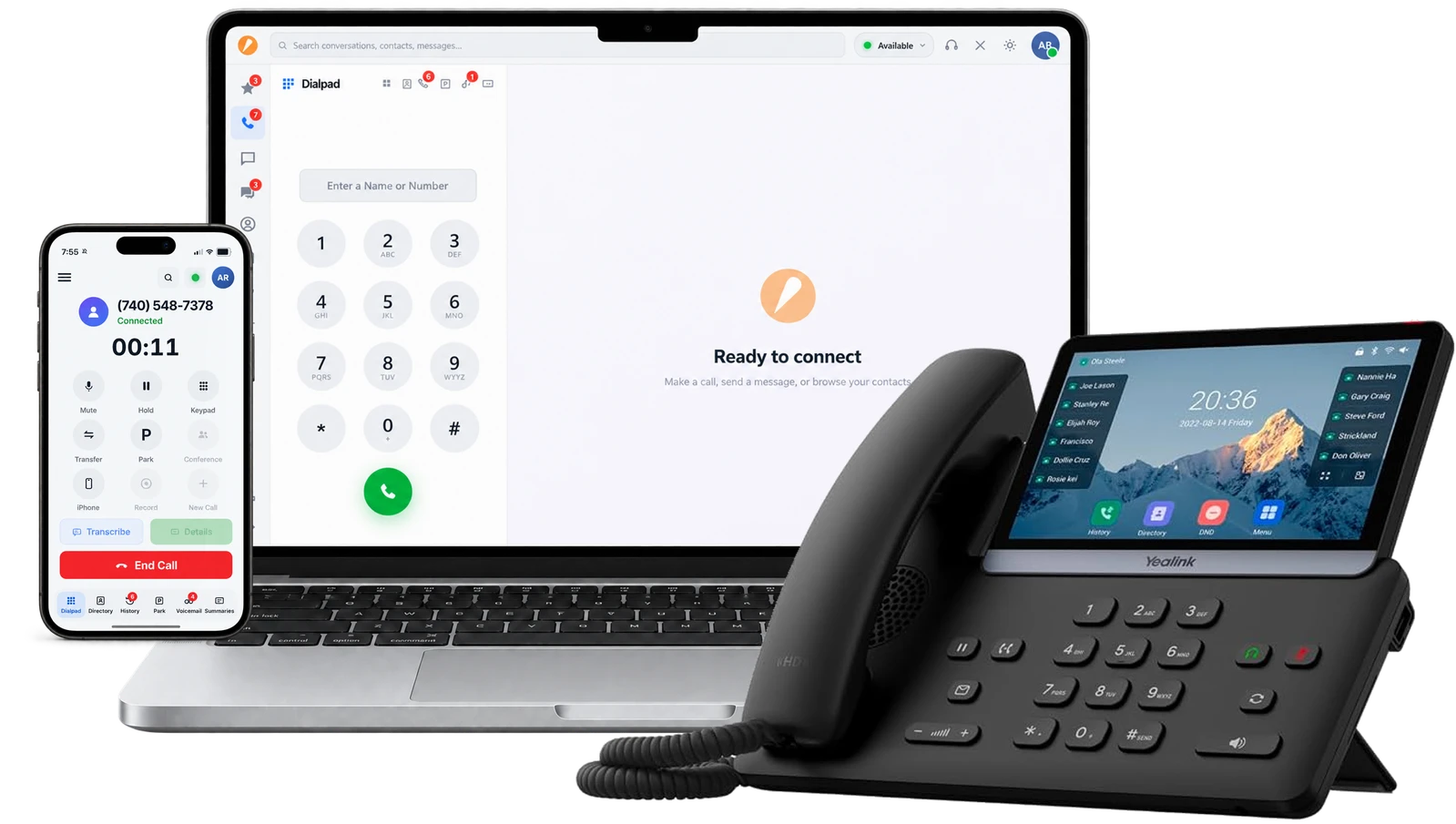 Accent app on a laptop and phone beside a Yealink desk phone