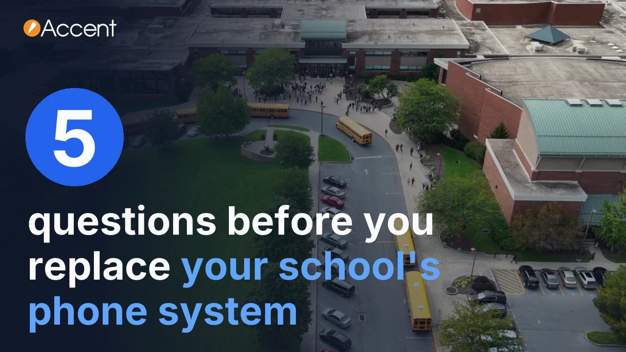 Aerial view of a school with yellow buses at dismissal, with the words: 5 questions before you replace your school's phone system