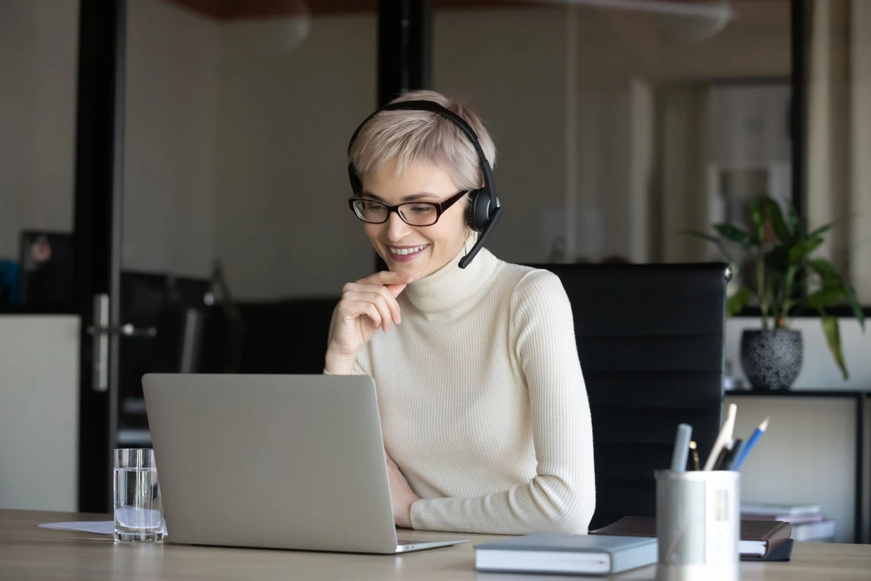 Friendly contact center agent wearing professional headset