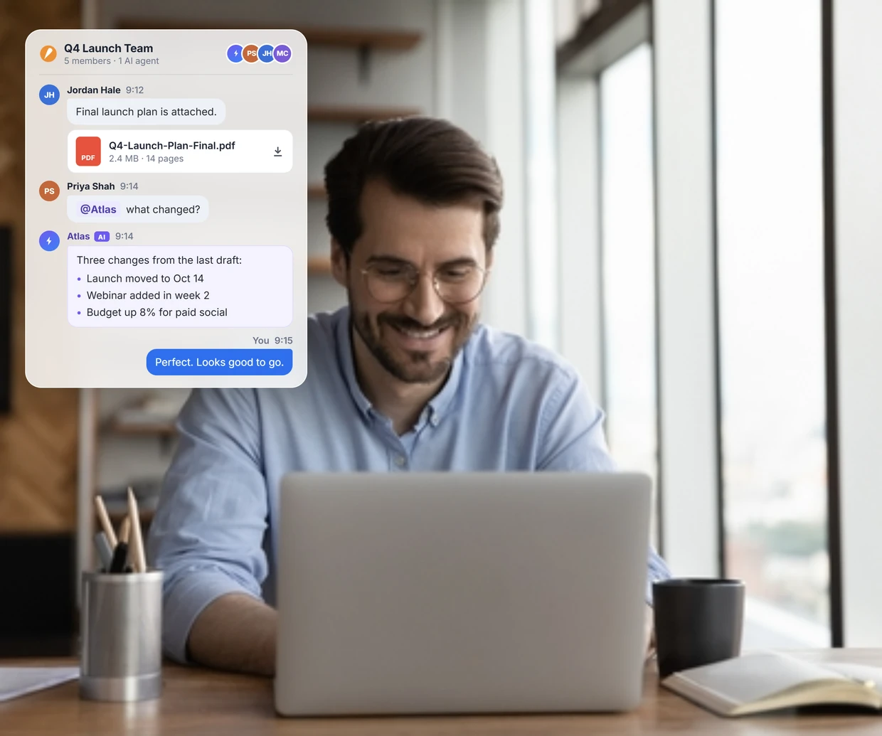 Man at a laptop next to a team chat with an AI agent